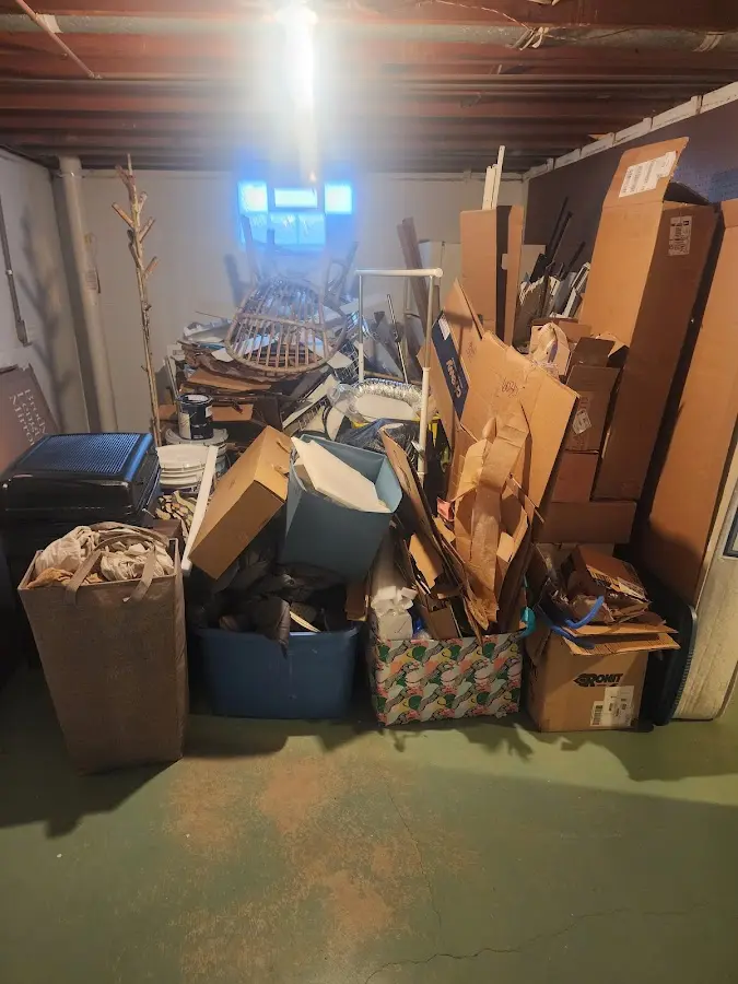 Roll-off dumpster container at job site for 4 Yard Dumpster Rental in Rockingham